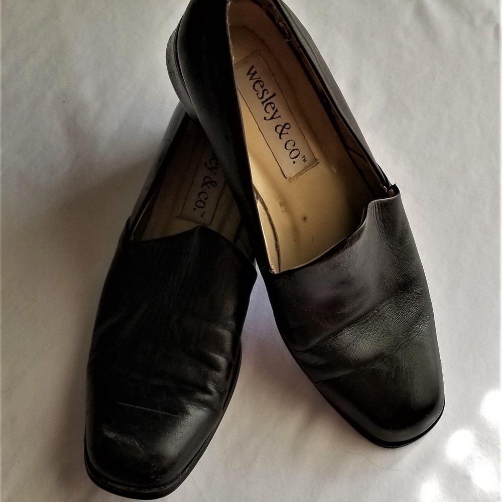 black leather pumps